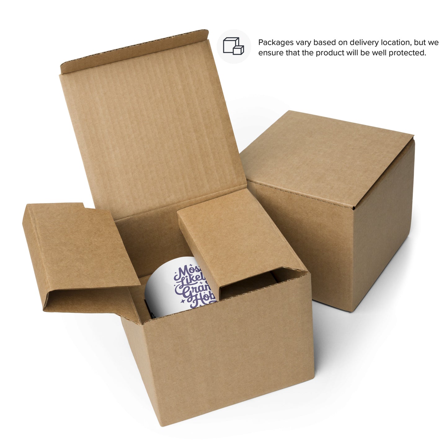 two cardboard boxes, one open and one closed, with a white mug inside the open box.