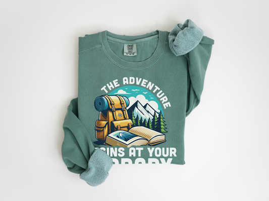 a green shirt with a picture of a school bus on it librarian sweatshirt