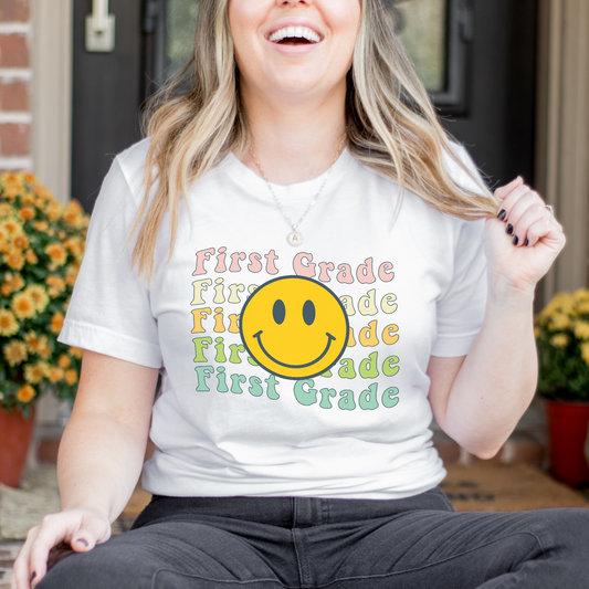 First Grade Teacher smiley face tshirt