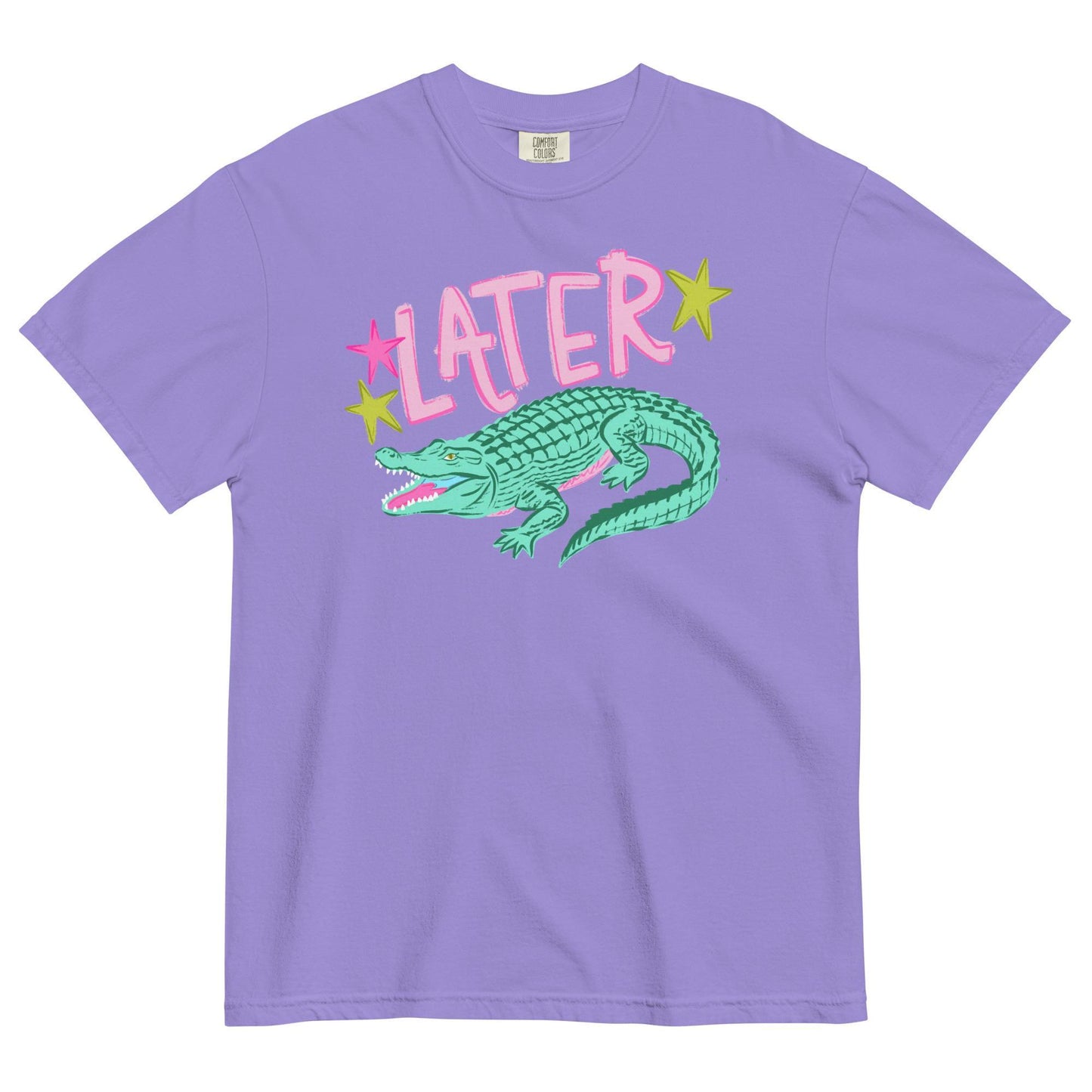 A purple t-shirt with a graphic design featuring a green alligator and the word "later" written above it.