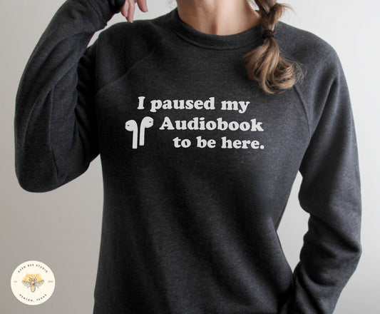 I Paused My Audiobook Unisex Raglan Crewneck Sweatshirt