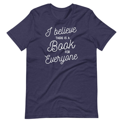 A navy blue t-shirt with white text that reads "I believe there is a book for everyone".