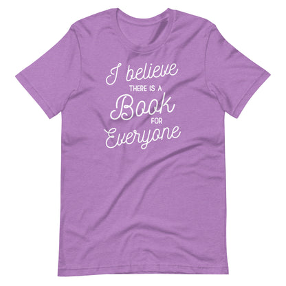 A purple t-shirt with the text "I believe there is a book for everyone" printed on it.