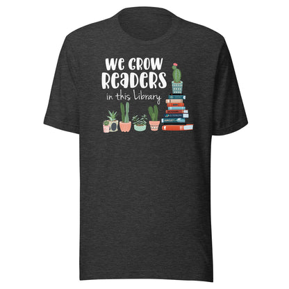 We Grow Readers in this Library Short Sleeve T-shirt