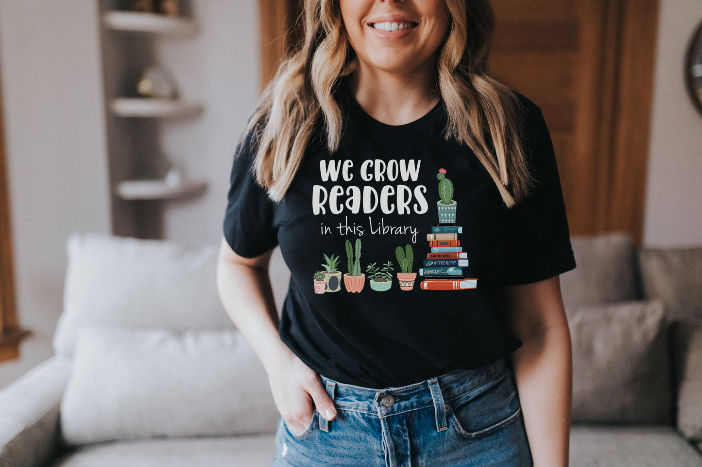 We Grow Readers in this Library Short Sleeve T-shirt